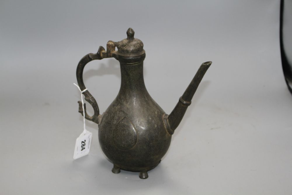 A late 18th century Mughal brass ewer, with incised decoration